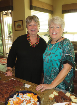Karen Hustad (left) and Judy Stanard (right) co-hosted the Resurrection Church at SaddleBrooke women’s group social on November 14.