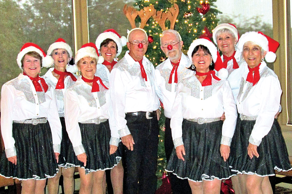 Santa’s elves, with two Rudolphs, (AKA the Coyote Country Cloggers) performed at the MountainView Lady Putters Christmas luncheon.