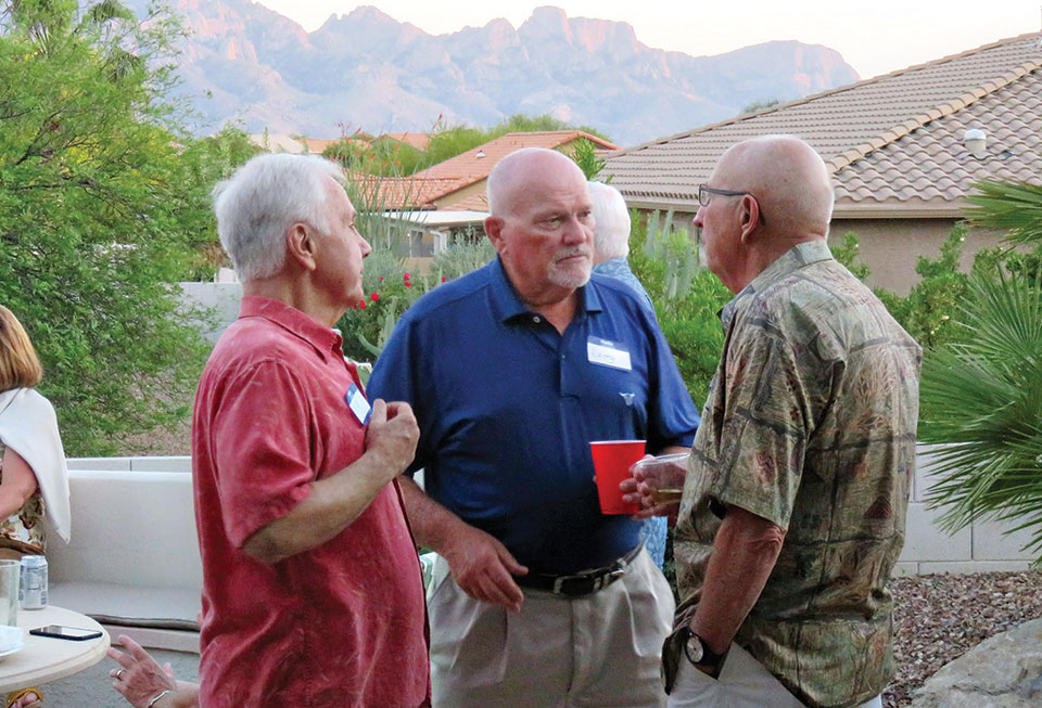 Neighborly discussion with beautiful mountain views; photo by Ron Talbot