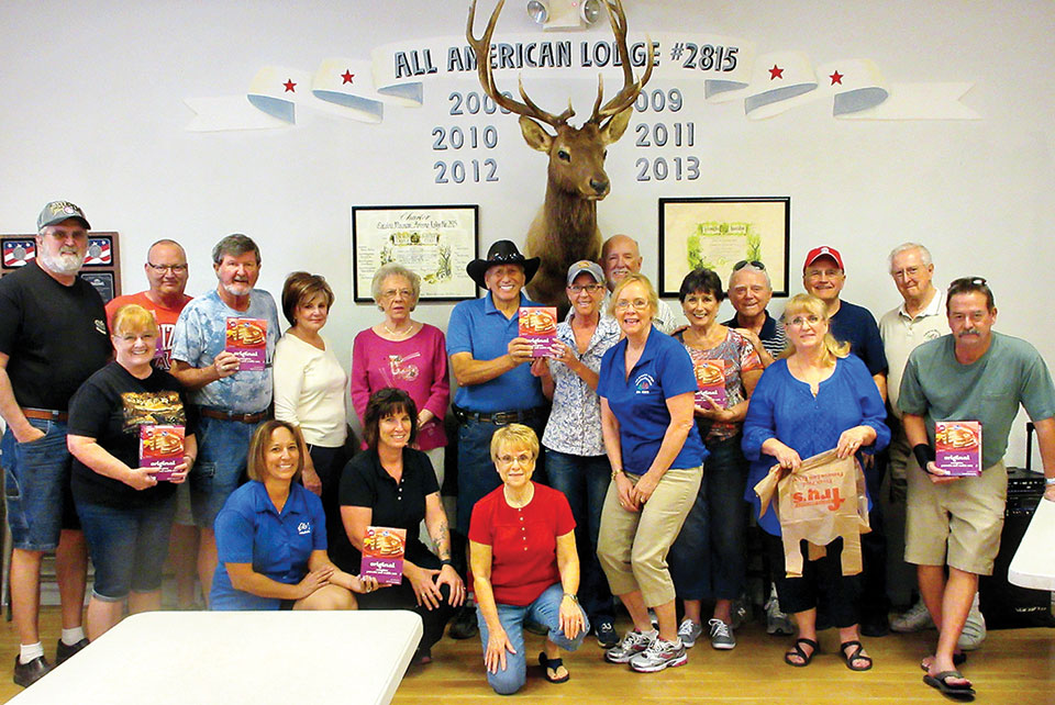 Elks members assembled 350 breakfast food bags for IMPACT.