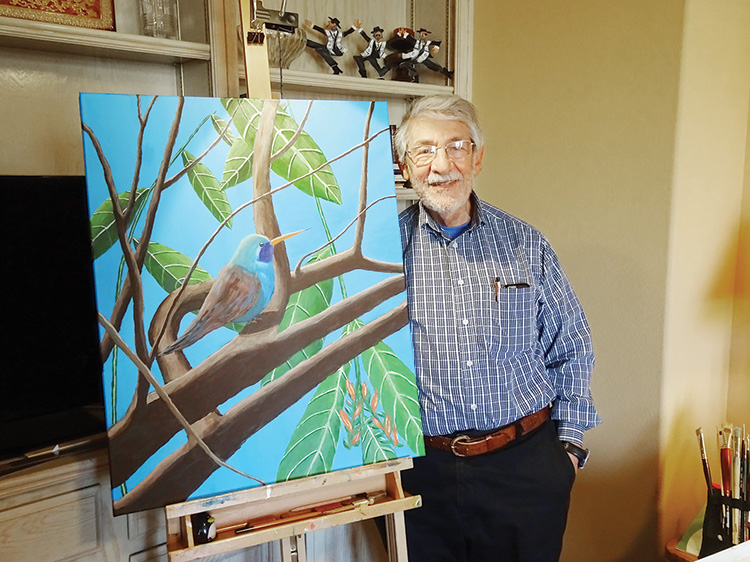 Howard Cohen displays his recently completed work, Hummingbird at Rest. (Photo by LaVerne Kyriss)