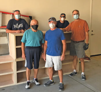 SaddleBrooke Ranch woodworkers (left to right): Ron Gustafson, Jeff Hansen, Barry Milner, Scott Saxson, and Dan Carter made bookcases for first grade students in Kearny.