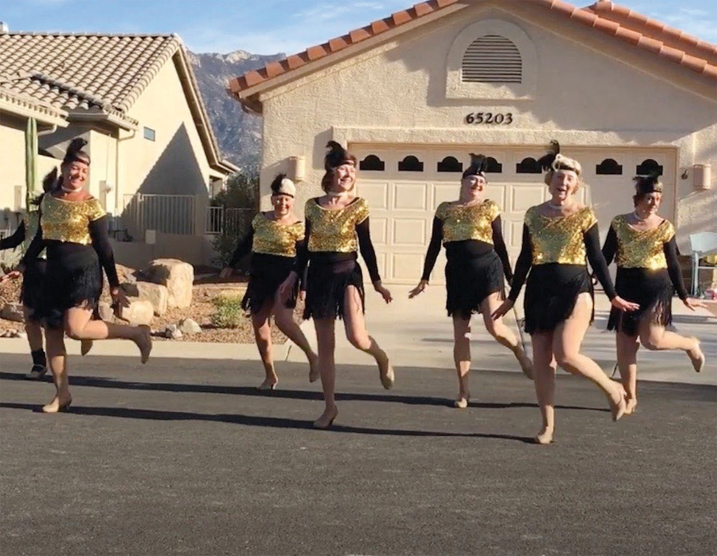 The SilverBelles danced on Diamond Ridge cul-de-sac for a very enthusiastic audience in Unit 10. This was the debut for their new dance to “Hot Honey Rag.”