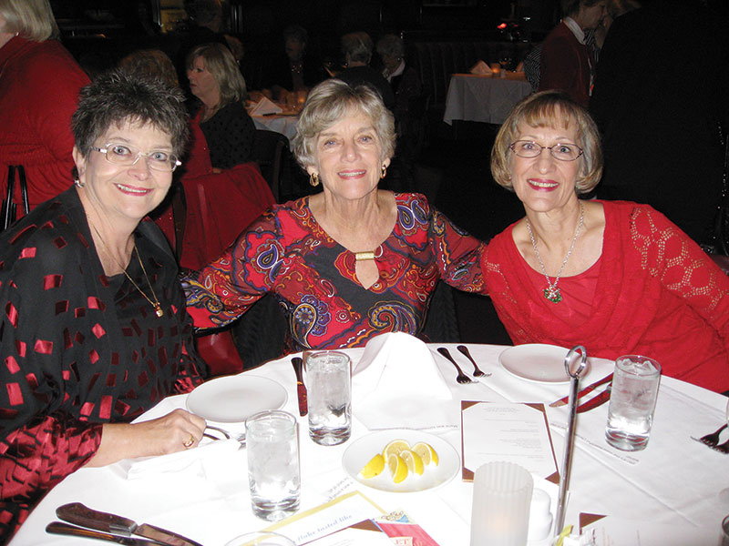 Nancy Gearhard, Eileen Halk and Marcia Munich enjoy the Unit 21’s Ladies Holiday Luncheon at Fleming’s Prime Steakhouse.