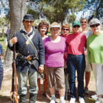 Back row: Dana Parker, Gerry Autry, Renee Beste and Kathy Duarte; front: Mary Worthy, soldier Private Louis Caldera, Sande Rivas, Barbara van Brunt and Margaret Falkowski. Photo by Jerry Parker
