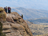 Adventure Club members rapel off a cliff face on Mount Lemmon