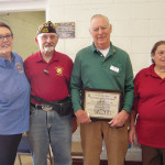 Left to right: Mrs. Kim Sloan, Ladies Auxiliary of the VFW; Commander George Phillips, VFW Post 10188; George Bidwell of SaddleBrooke Troop Support and President of Ladies Auxiliary VFW Post 10188 Francine Phillips