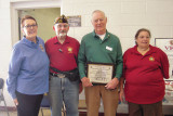 Left to right: Mrs. Kim Sloan, Ladies Auxiliary of the VFW; Commander George Phillips, VFW Post 10188; George Bidwell of SaddleBrooke Troop Support and President of Ladies Auxiliary VFW Post 10188 Francine Phillips