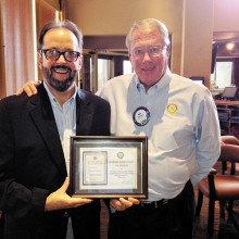 Rotarian Neil Deppe presents Don Chatfield with a certificate of appreciation.