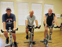 Indoor cyclists Gary Haslett, Keith Dickmann and Tom Oetlinger