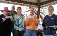 Becky Hilst, second from right, is the chief lyricist of the hiking club’s new anthem, sung to the tune of America the Beautiful; photo by Karen Schickedanz