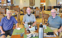 The Men’s Bible Study enjoy breakfast together.