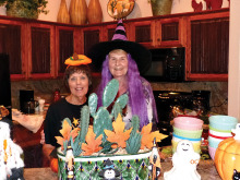 Jackie McCarthy (left) and Elke Mulligan spiritedly welcome us to the October luncheon.