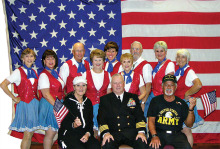 Pictured (from left, front) are Gina, Capt. Robert Stone and Gus; (from left, back) Pat Tiefenbach, Sylvia Bonesky, Dan Marsh, Stephanie Cady, Diane Korn, Pat Cox, Skip Brauns, Carol Jones and Donna Leonard.