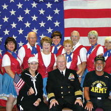 Pictured (from left, front) are Gina, Capt. Robert Stone and Gus; (from left, back) Pat Tiefenbach, Sylvia Bonesky, Dan Marsh, Stephanie Cady, Diane Korn, Pat Cox, Skip Brauns, Carol Jones and Donna Leonard.