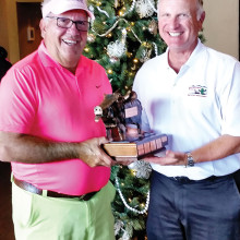 SMGA Special Events Chairman Gus Pachis awards the 2014 Javelina Cup to M-PMGA President Dennis Marchand.