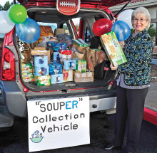 Shanna Schudda loads one of many collection vehicles.