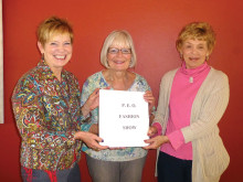 Dianne Ashby passes the reins to Mary Baglien and Vicki Graham who will co-chair next year’s event.