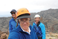 Roy Carter (front), Mike Wolters (left) and Frank Brier pose for a selfie at the top of Weaver’s Needle in the Superstitions.