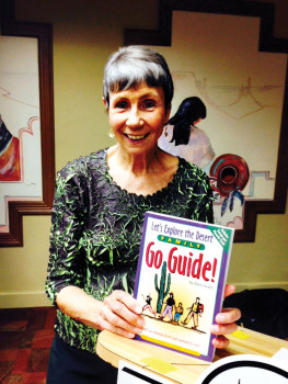 Doris Evans with her book, Let’s Explore the Desert Go Guide.