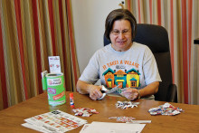 Emilie Siarkiewicz at work with the box tops and labels.