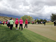 MVLPutters and SaddleBrooke Sputters putting under stormy skies