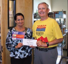 Mike Brenny presenting check to Michele Santorelli, program director