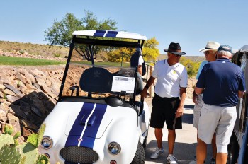 Oracle Ford sponsored a hole with their sexy Shelby Cobra custom golf cart.