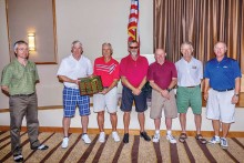 Mike Jahaske and past presidents Jon Michels, Chuck Kelsey, John Borchert, Tom Pryde, Ed Koch and current President Dennis Marchand receiving the plaque