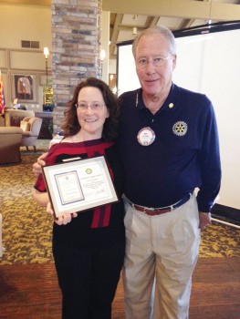 Neil Deppe presents Amy Reichgott a plaque in appreciation for her information about Western National Parks Association.