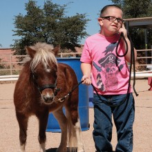 Colton with his adopted horse Scout