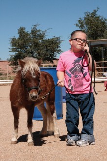 Colton with his adopted horse Scout