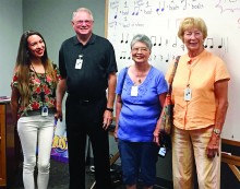 Music Teacher Kaitlyn Miller, SaddleBrooke Singers officers Sam Page, Loretta Tom and Sally Sample