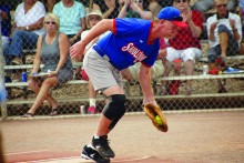 The crowd watches as this catcher makes the out at the plate; photo by Paul Jarzembinski.