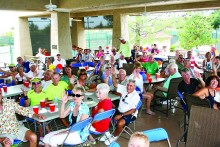 More than 100 members and guests enjoy a great lunch.