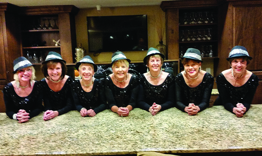 Bellied up to the bar at Brookdale/Ventana Canyon are Linda Schuttler, Ann Kurtz, Vivian Herman, Claudia Booth, Laurie Page, Dianne Bank and Janifer Farquhar.