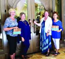 Models and P.E.O. style show committee members enjoy a shopping trip to Soft Surroundings.