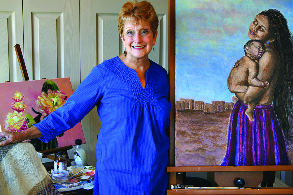Loraine Stillman paintings Eternal Bond, Cactus Study and woven throw; photo by J. Cohen