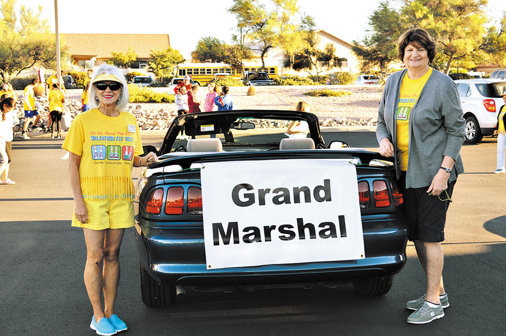 Grand Marshals Melanie Stout and Anni Evans were selected to lead the walk because of their longtime dedication to Kids’ Closet.