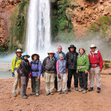 At the base of Mooney Falls, left to right: Frank Earnest, Dianne Ashby, Elaine Fagan, Rob Simms, Phil McNamee, Bertie Litchfield, Ken Wong, Marge Wong and Walt Shields; photo by Stewart Lasseter.