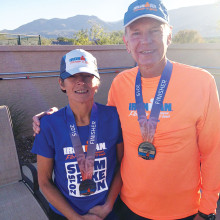 Ironman finishers Margaret Valair and Leonard Kershaw