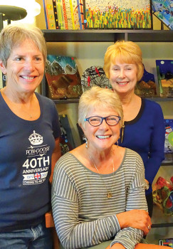 Terese Butler, Pam Gappa and Candy Armstrong with a few of their fused glass creations; photo by LaVerne Kyriss