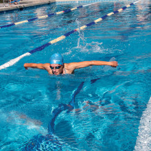 Joyce Howard competes in the butterfly event.