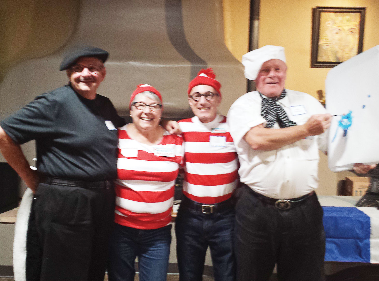 Creative Costume winners: Frank Hartley (Pepe’ Le Pew), The DiEnnos (Where’s Waldo?) and Lynn Clemens (Monet)