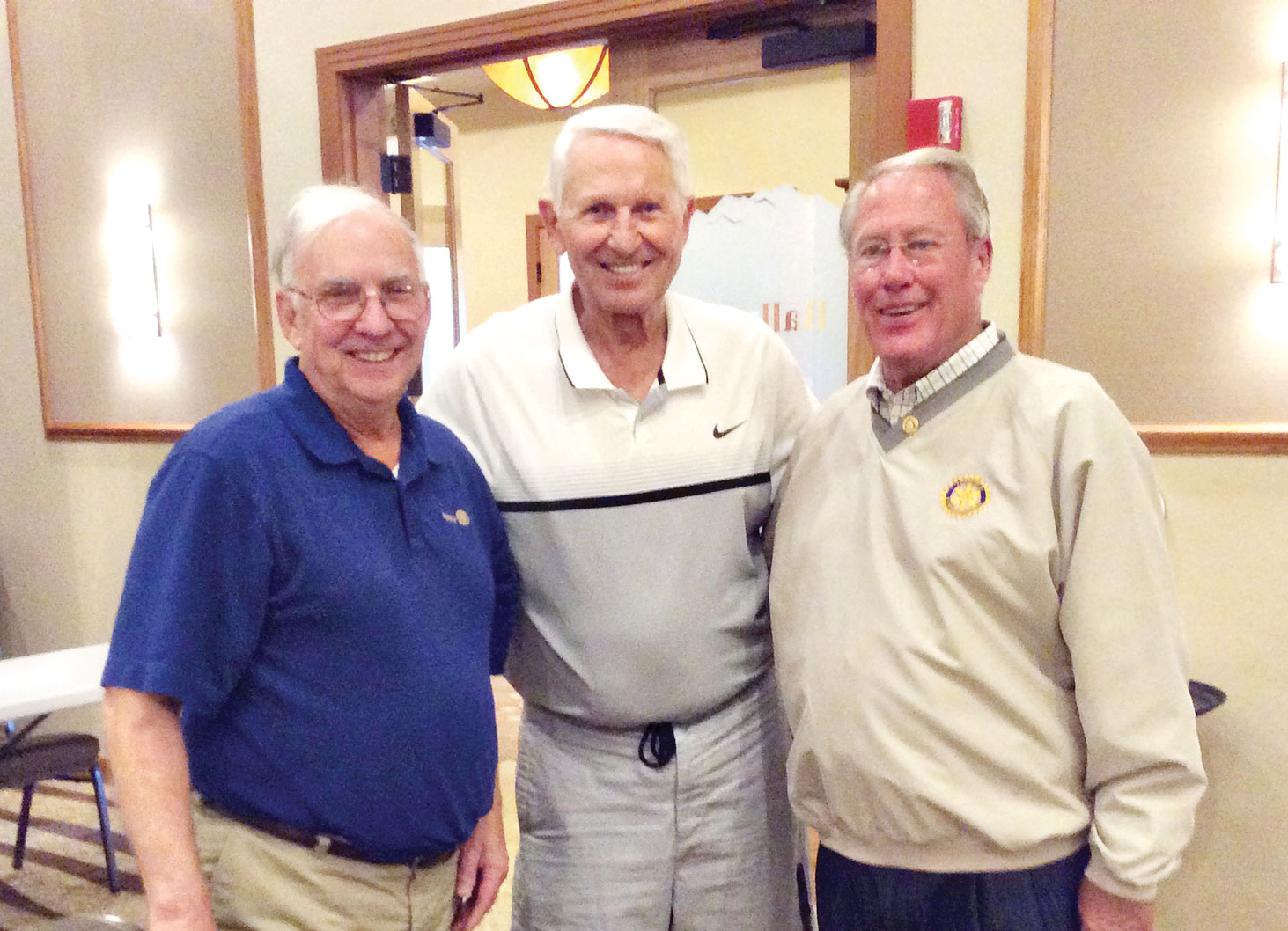 Lute Olson with Neil Deppe and Joe Guyton after receiving his Paul Harris Fellowship Award for his continued support of the tournament