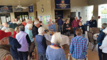 Freethinkers gather for a potluck dinner.