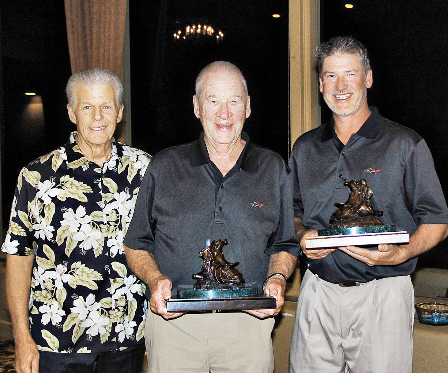 SMGA President Greg Tarr presents Bertil and Fredrik Sultan with the coveted RoadRunner Classic Saddle Trophies.