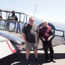 Fred Klein (right) checks flying a P-51 Mustang off his bucket list (shown with his co-pilot).