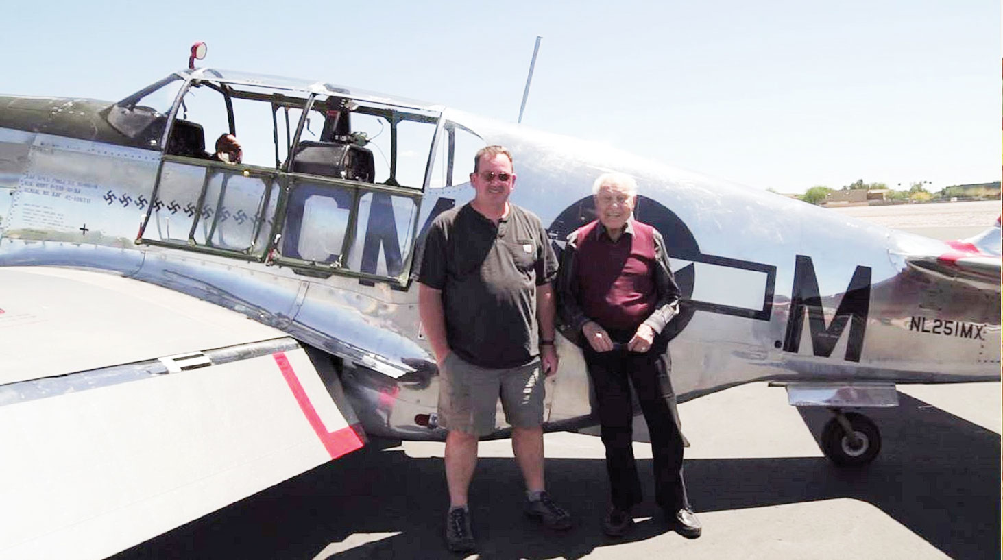 Fred Klein (right) checks flying a P-51 Mustang off his bucket list (shown with his co-pilot).
