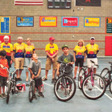 The CycleMasters enjoyed presenting bicycles to these deserving students.